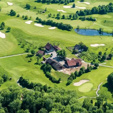 golfplatz-holzhaeusern-1180×625 Golfplatz Holzhäusern